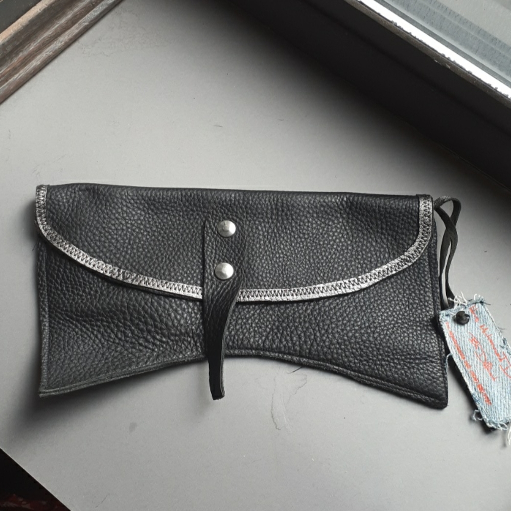 Idris Muhammad designs Be Different clutch